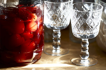 Image showing glass jar with canned apples sunlit