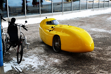 Image showing yellow recumbent parked at the office