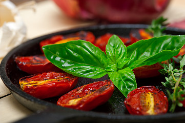 Image showing baked cherry tomatoes with basil anf thyme