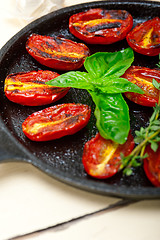 Image showing baked cherry tomatoes with basil anf thyme