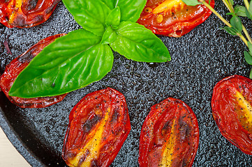 Image showing baked cherry tomatoes with basil anf thyme