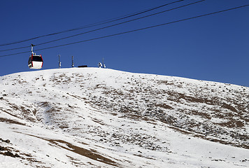 Image showing Gondola lifts and slope with stones