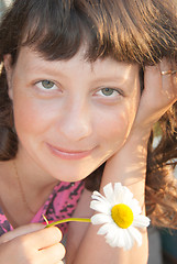 Image showing Girl with flower