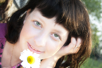 Image showing Girl with flower