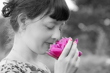 Image showing Girl with flower