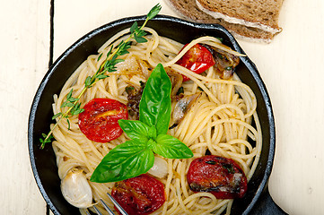 Image showing spaghetti pasta with baked cherry tomatoes and basil 