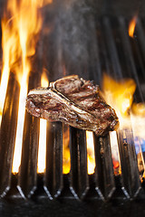 Image showing T-bone steak on the barbecue