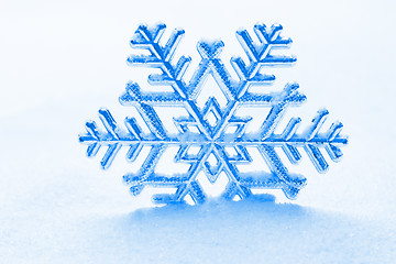 Image showing snowflake against a background of snow