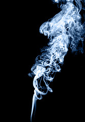 Image showing Real blue smoke over black background