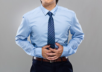 Image showing Businessman with stomachache
