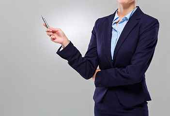 Image showing Businesswoman with pen point up