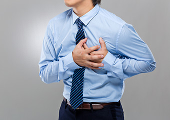 Image showing Businessman with heart attack