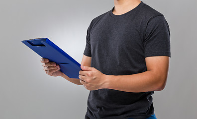 Image showing Man hold with clipboard