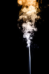 Image showing Gold and white smoke on black background 