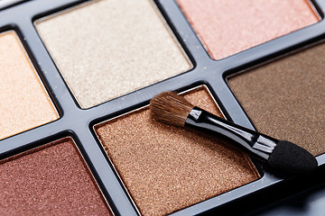 Image showing Black palette of colorful eye shadows