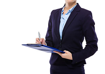 Image showing Businesswoman take note on clipboard