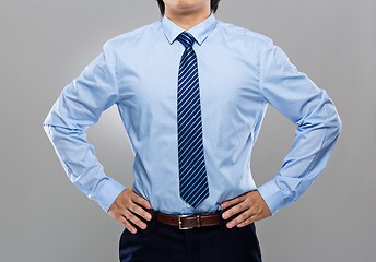 Image showing Businessman with hand on waist