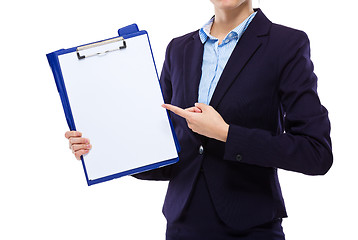 Image showing Businesswoman finger point to blank paper of clipboard