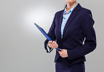 Image showing Businesswoman hold with clipboard