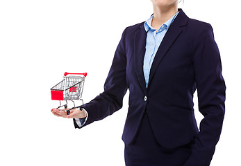Image showing Businesswoman hold with small shopping cart