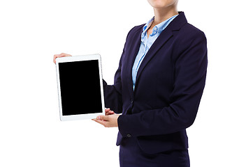 Image showing Businesswoman show digital tablet with blank screen