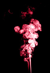 Image showing Red smoke isolated on black 