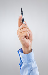 Image showing Businessman hand point up