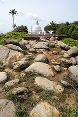 Image showing Smal dagoba and big stones