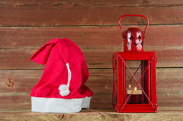 Image showing Santa Claus cap and red Christmas lantern