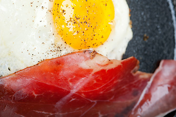 Image showing egg sunny side up with italian speck ham