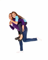 Image showing Mother piggyback her daughter.