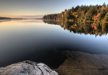Image showing Lake in Autumn sunrise reflection