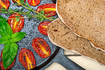 Image showing baked cherry tomatoes with basil and thyme