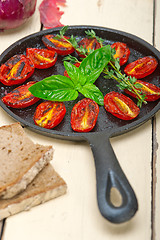 Image showing baked cherry tomatoes with basil and thyme