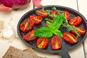 Image showing baked cherry tomatoes with basil and thyme