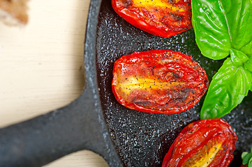 Image showing baked cherry tomatoes with basil and thyme