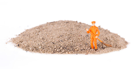 Image showing Miniature worker is cleaning a keyboard