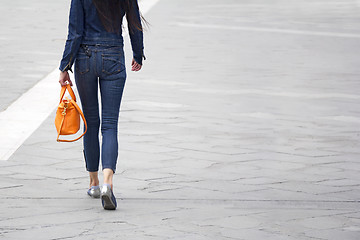 Image showing Woman with orange bag