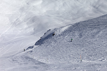 Image showing Skiers on off-piste slope in nice sun day