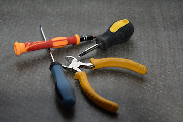 Image showing Set of screwdrivers and mippers