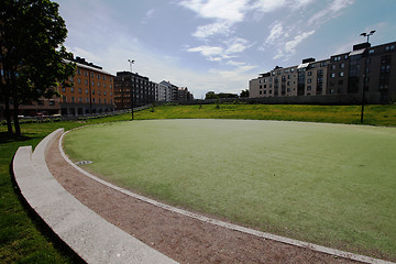 Image showing round green lawn in a residential area of Helsinki