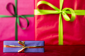 Image showing Blue gift with golden bowknot
