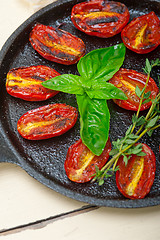 Image showing baked cherry tomatoes with basil and thyme