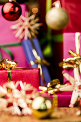 Image showing Small Red Gift Box under Baubles