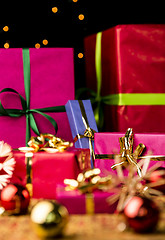 Image showing Six Wrapped Christmas Gift Boxes