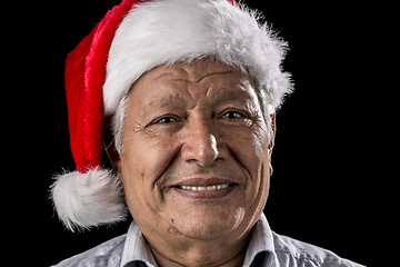 Image showing Venerable Man with Red Father Christmas Cap