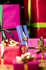 Image showing Golden Twinkles, Bows and Gift Boxes