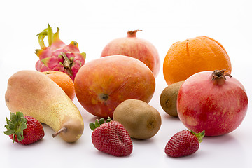 Image showing Mango, pomegranate, pitaya, orange, pear, kiwi and mandarine