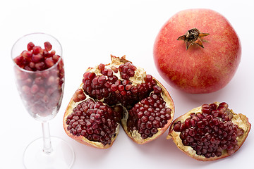 Image showing Pomegranate, whole and broken-up