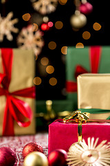 Image showing Christmas Gifts, Glitters, Baubles and Stars